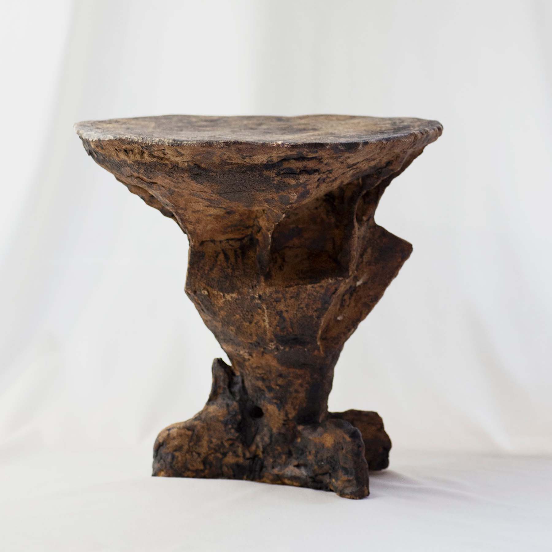 Handmade and one-of-a-kind ceramic side tables in brown nuances