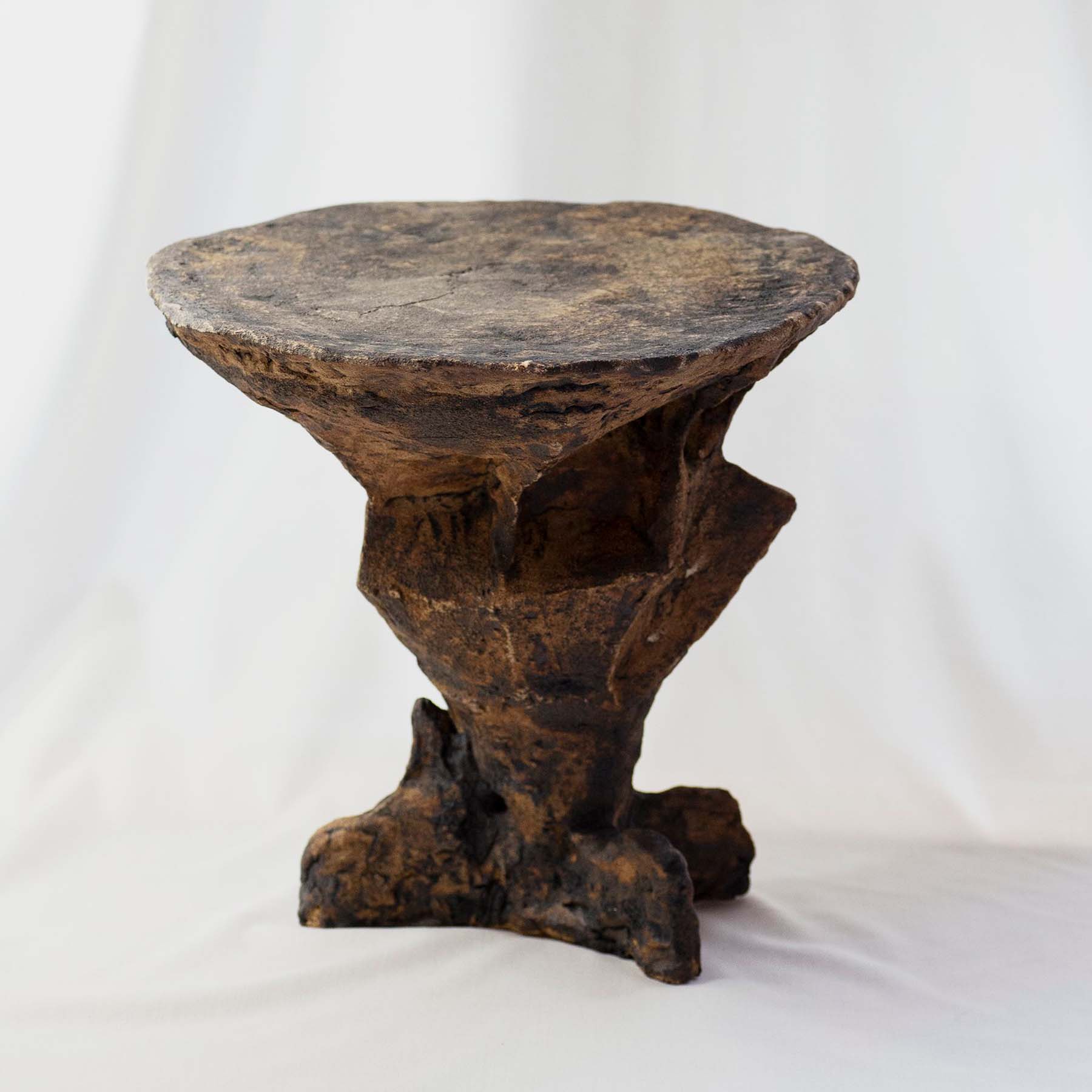 Handmade and one-of-a-kind ceramic side tables in brown nuances