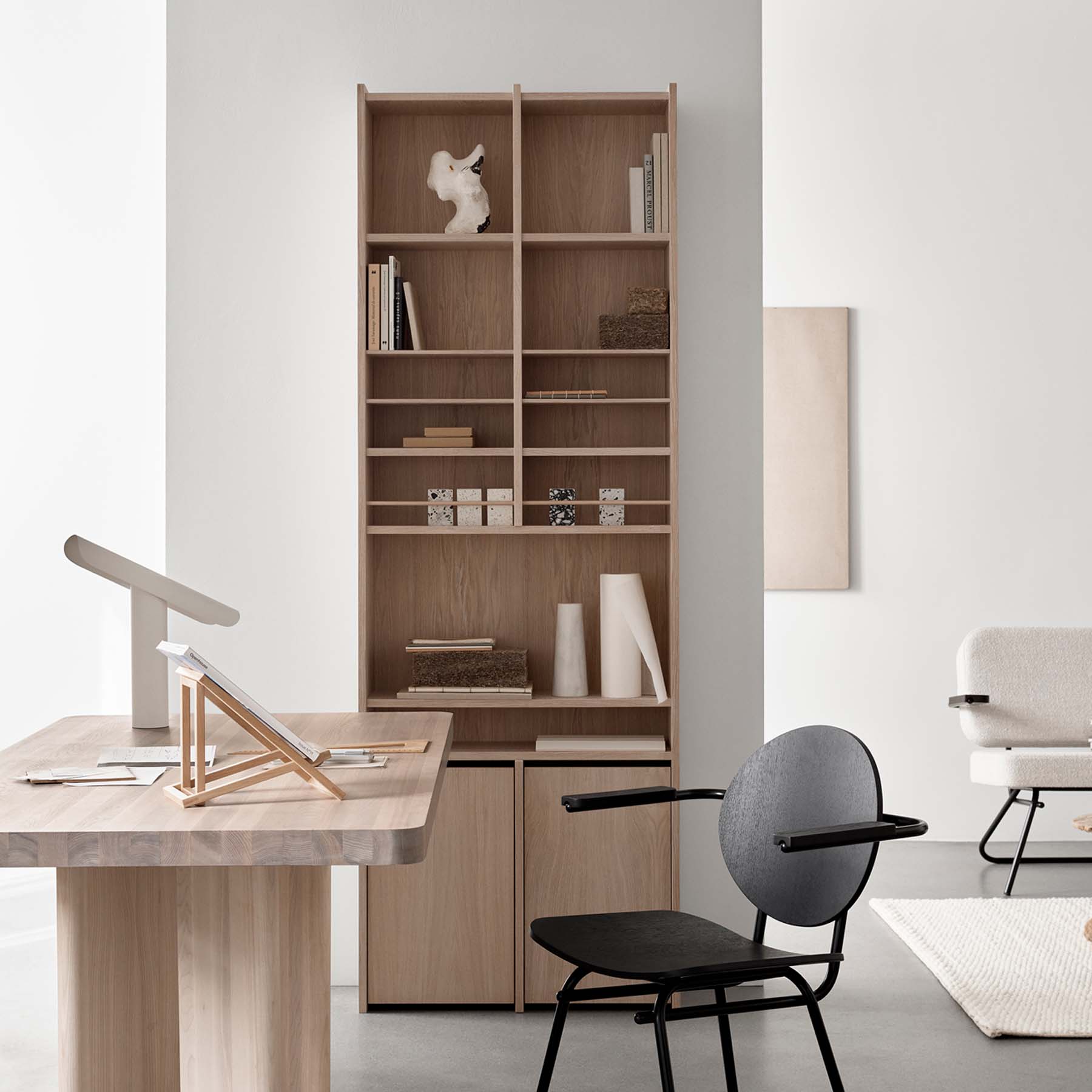 Natural oak shelving system in a home office